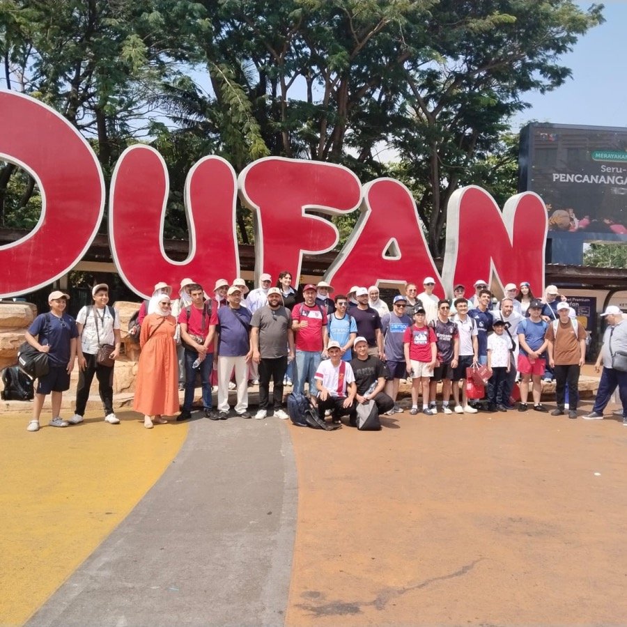 A large group with Alfathan, group photo at Dufan Jakarta — an example of a group trip we've served